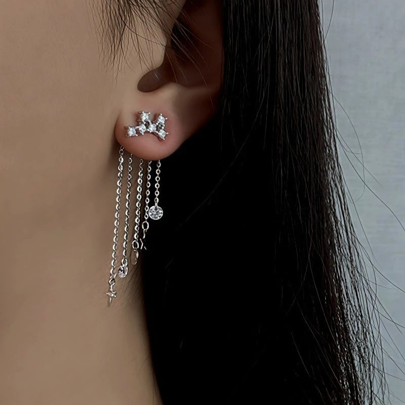 Model showcasing the dangle and style of the Sterling Silver Elegant Zircon Diamond Tassel Earrings