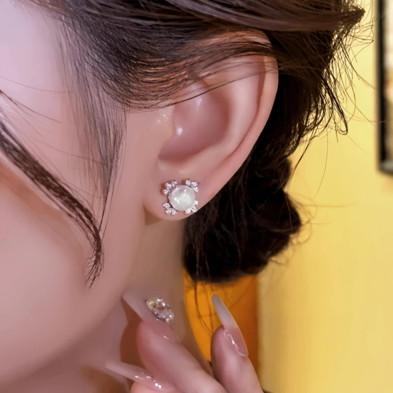 Close-up detail of the sparkling zircons and plating on the Clover Bead Studs