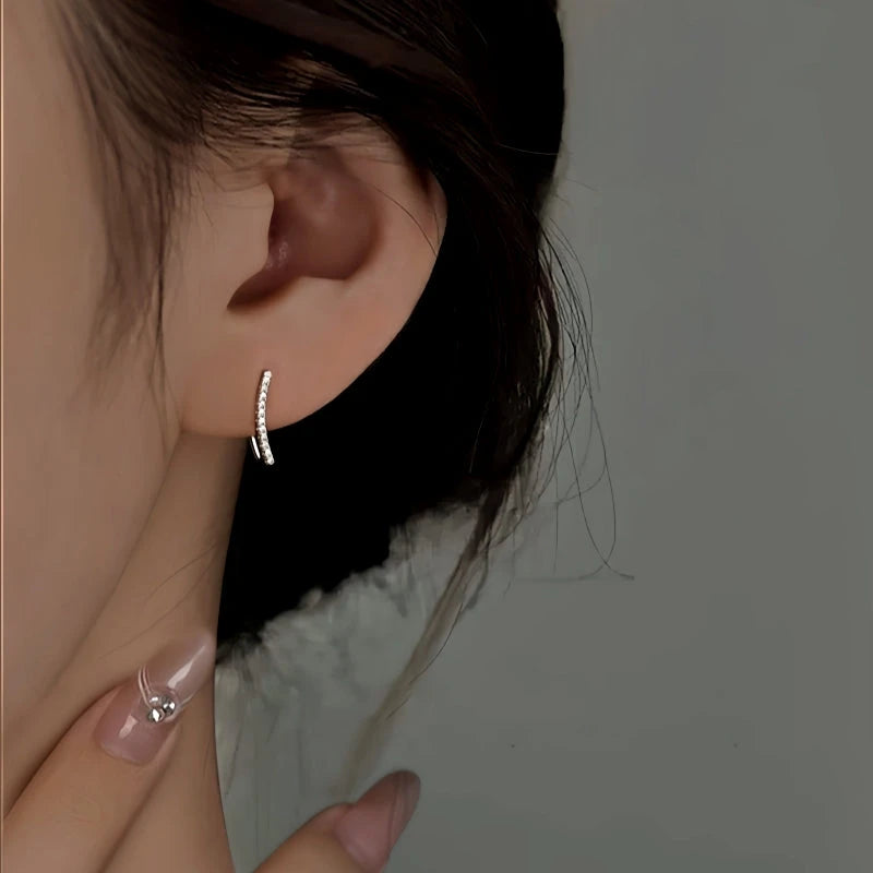 Angled view of the Sterling Silver Elegant Zircon U-Shaped Earrings