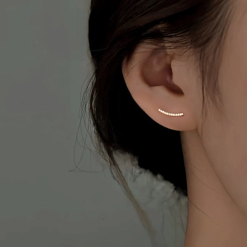 Close-up detail of the sparkling zircons and plating on the U-Shaped Earrings