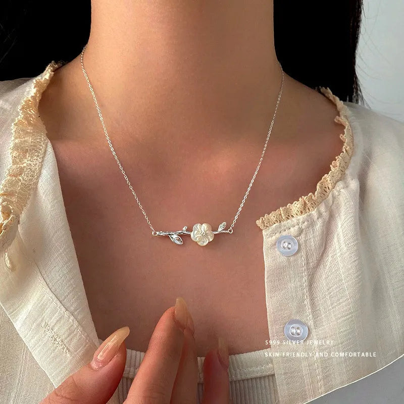 Sterling Silver Exquisite Flower Branch Necklace worn to showcase its length and pendant detail