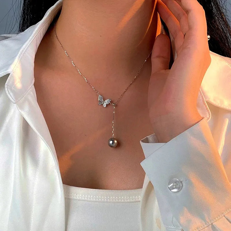 Sterling Silver Fantasy Diamond Butterfly Pearl Necklace worn to showcase its length and pendant detail