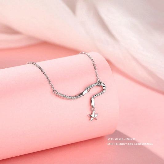 Sterling Silver Fantasy Diamond Shooting Star Necklace worn to showcase its length and pendant detail