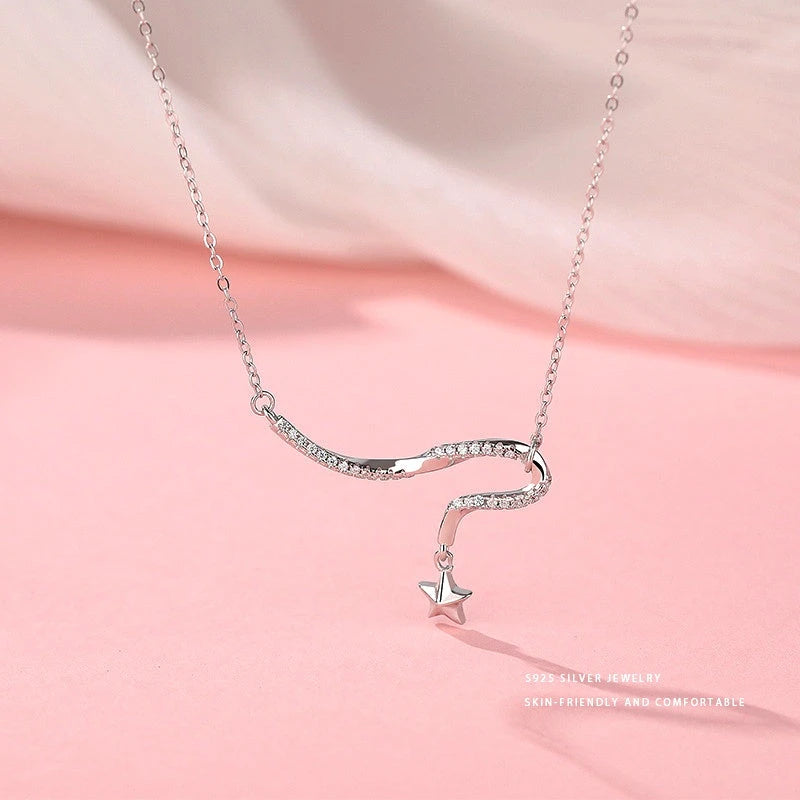 Close-up of the pendant and clasp on the Shooting Star Necklace