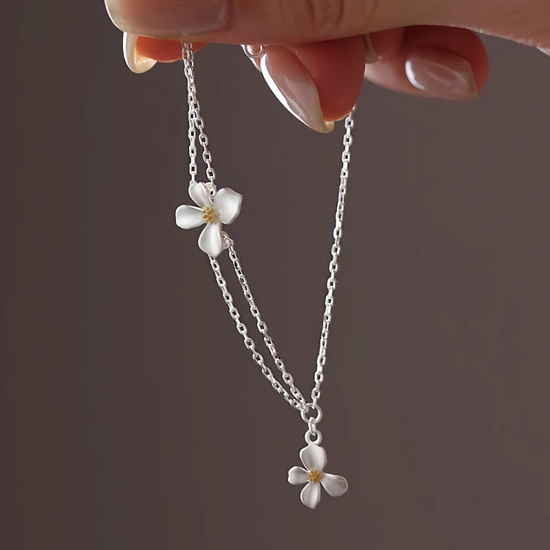 Close-up of the clasp and charm details on the Flower Bracelet