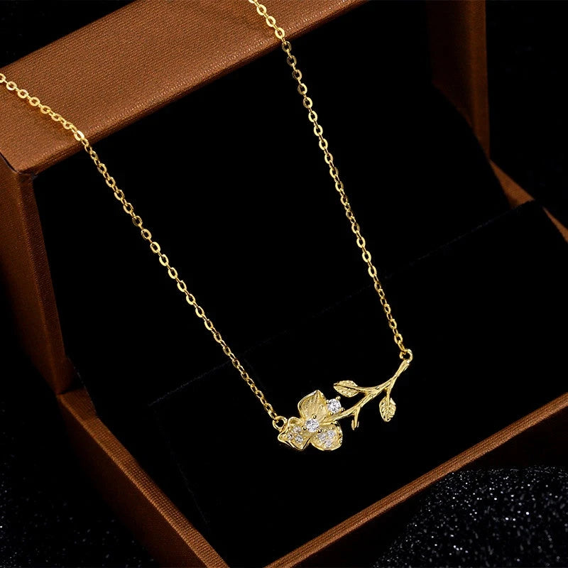 Sterling Silver Flower Branch Girl Necklace worn to showcase its length and pendant detail