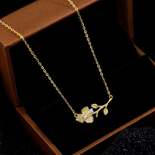 Sterling Silver Flower Branch Girl Necklace worn to showcase its length and pendant detail