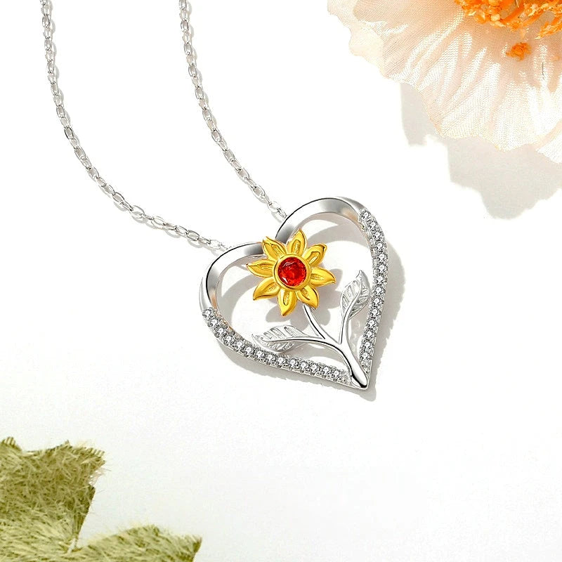 Sterling Silver Flower Heart Necklace worn to showcase its length and pendant detail