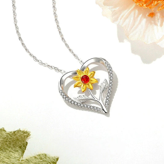 Sterling Silver Flower Heart Necklace worn to showcase its length and pendant detail
