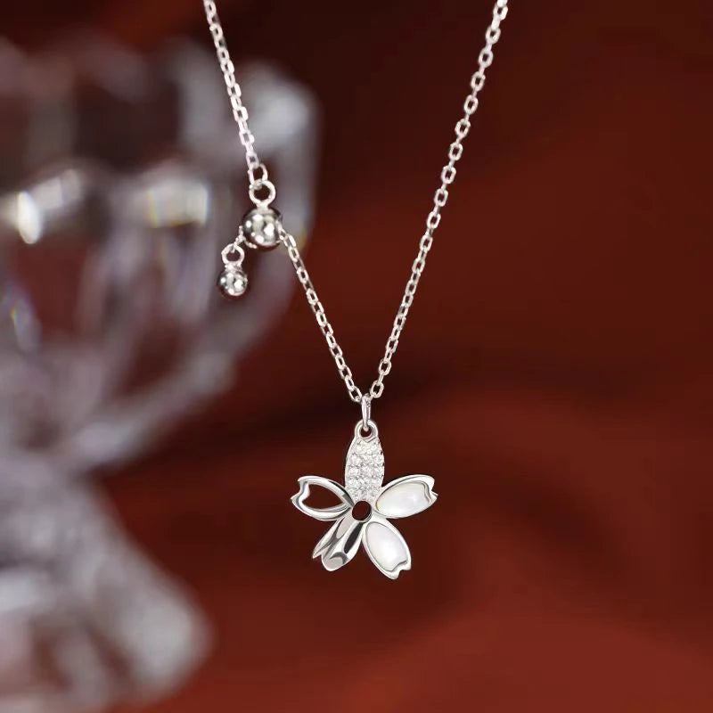 Close-up of the pendant and clasp on the Flower Tassel Necklace