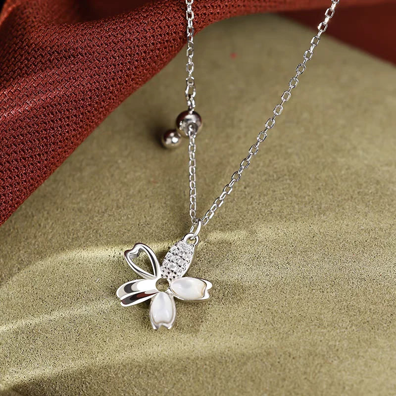 Detailed view of the Sterling Silver Flower Tassel Necklace chain and pendant