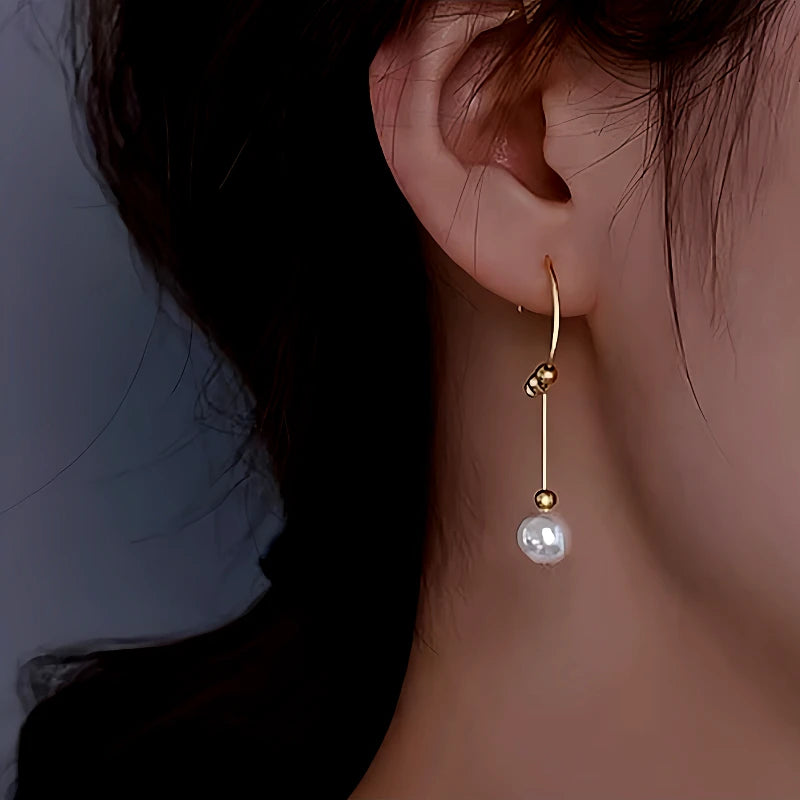 Close-up detail of the sparkling zircons and plating on the Geometric Bead Earrings