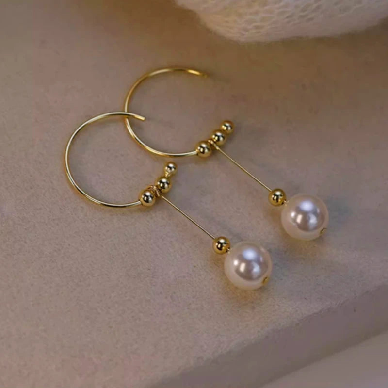 Angled view of the Sterling Silver Geometric Bead Earrings