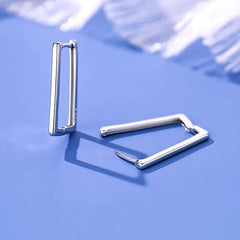 Close-up detail of the sparkling zircons and plating on the Rectangular Earrings