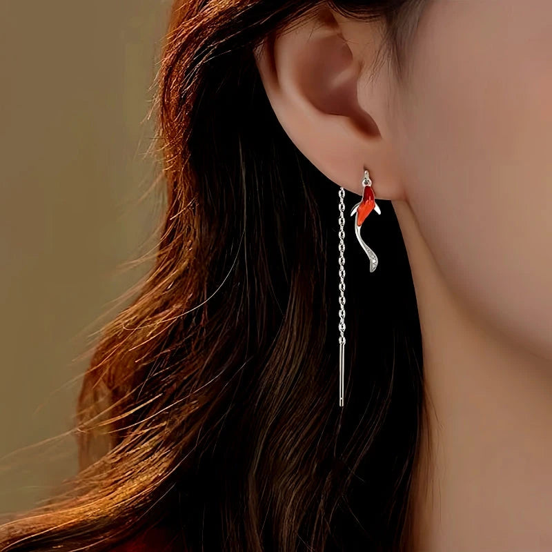 Model showcasing the dangle and style of the Sterling Silver Gold Fish Threader Earrings