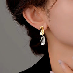 Close-up detail of the sparkling zircons and plating on the Two-Tone Earrings