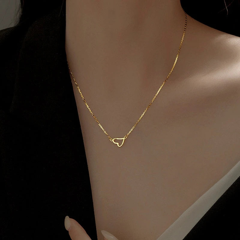 Sterling Silver Heart-Design Necklaces worn to showcase its length and pendant detail