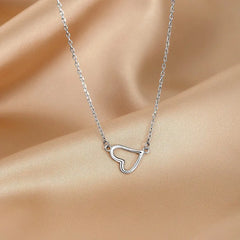 Close-up of the pendant and clasp on the Heart-Design Necklace