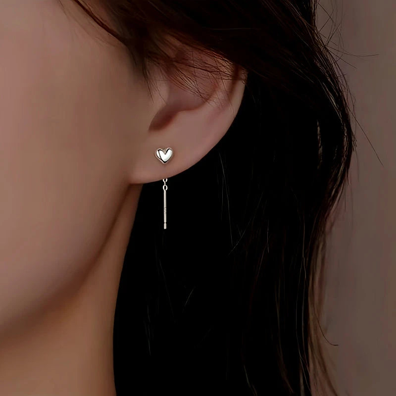 Close-up detail of the sparkling zircons and plating on the Heart Threader Earrings