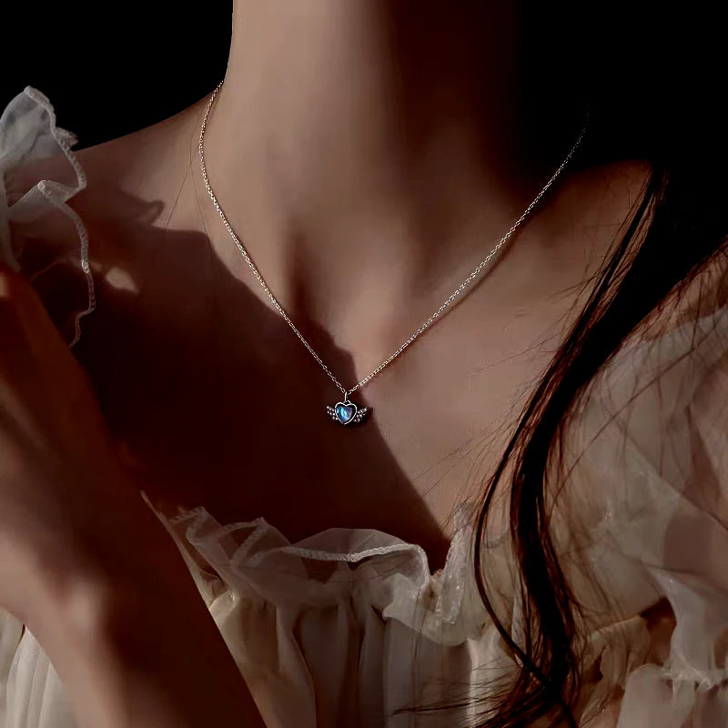 Close-up of the pendant and clasp on the Angel Wing Necklace