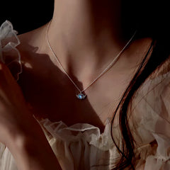 Close-up of the pendant and clasp on the Angel Wing Necklace