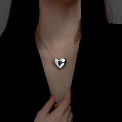 Sterling Silver Heart Necklace worn to showcase its length and pendant detail