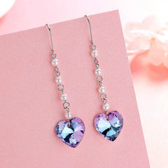 Close-up detail of the sparkling zircons and plating on the Pearl Tassel Earrings