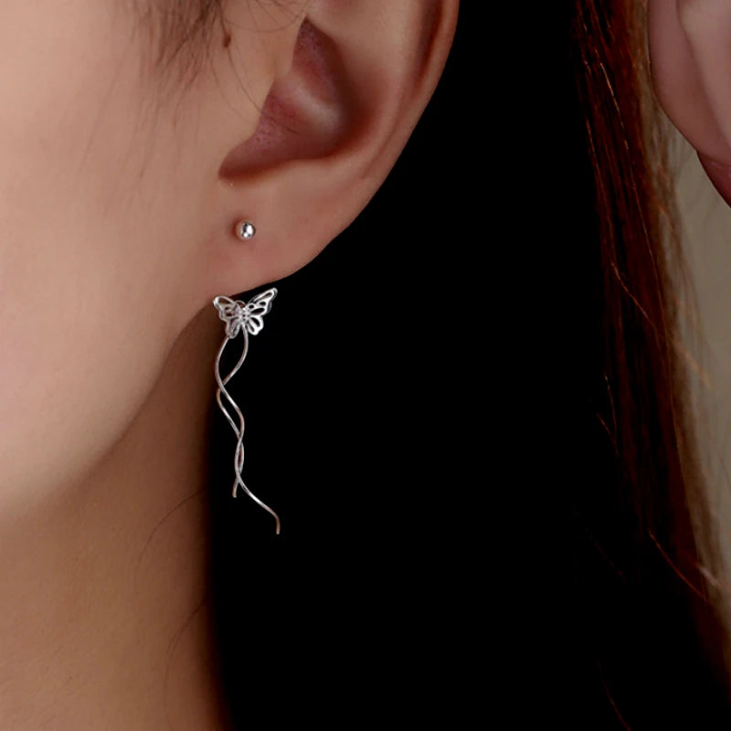 Close-up detail of the sparkling zircons and plating on the Butterfly Tassel Earrings