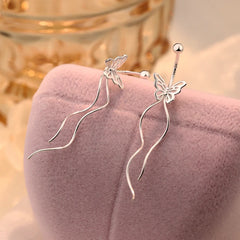 Angled view of the Sterling Silver Hollow Butterfy Screw Tassel Earrings