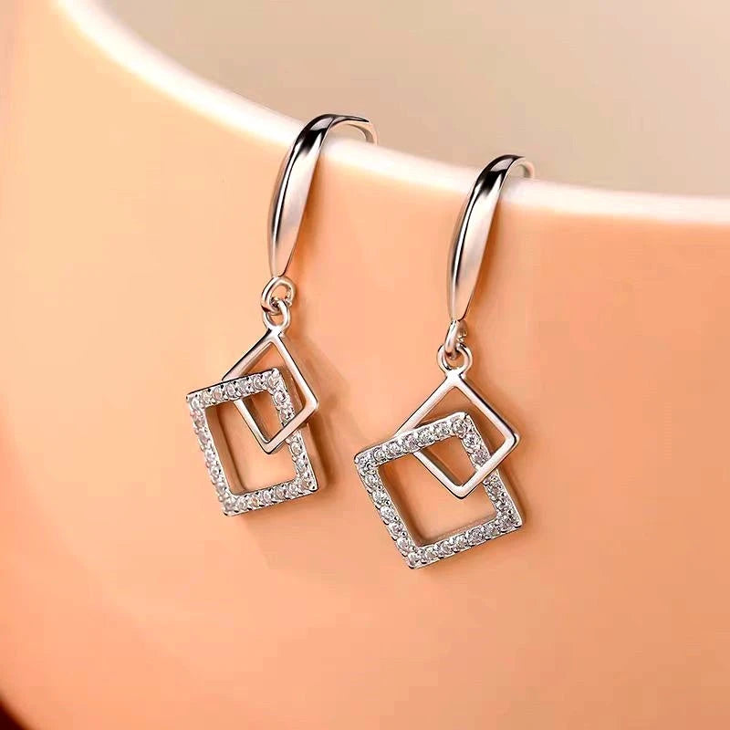 Close-up detail of the sparkling zircons and plating on the Diamond Shape Earrings