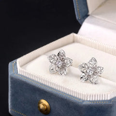 Close-up detail of the sparkling zircons and plating on the Hollow Flower Studs