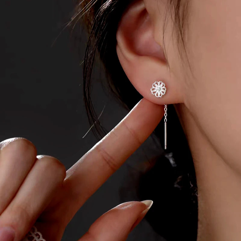 Close-up detail of the sparkling zircons and plating on the Flower Threader Earrings