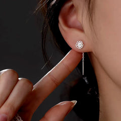 Close-up detail of the sparkling zircons and plating on the Flower Threader Earrings