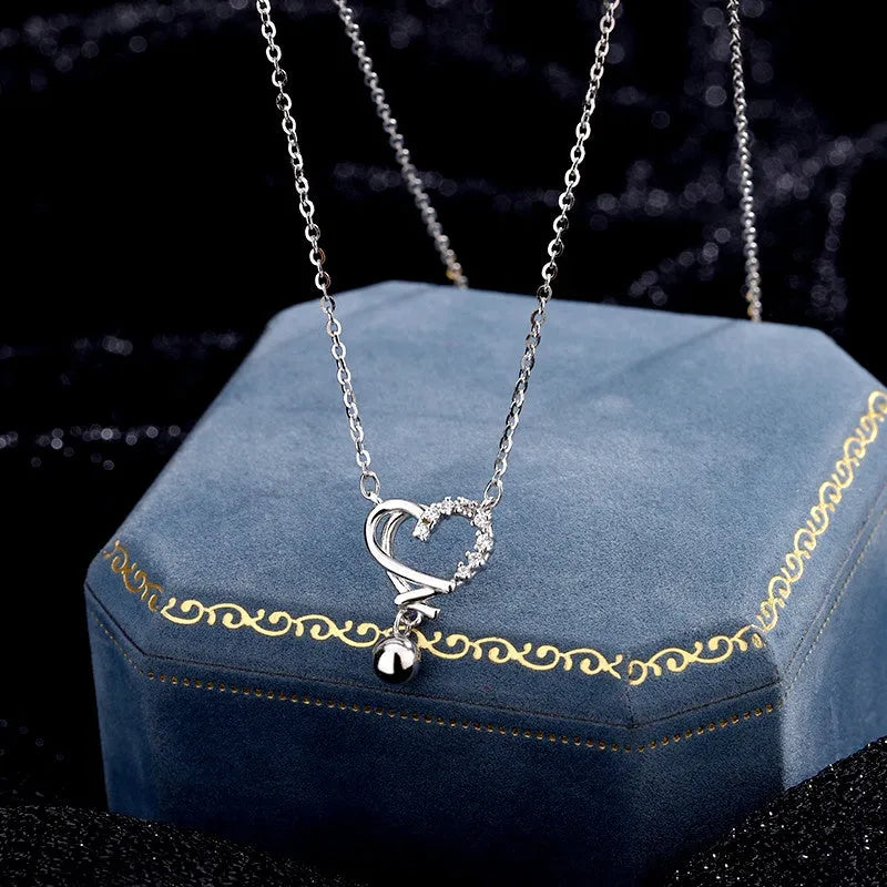 Detailed view of the Sterling Silver Hollow Heart Necklace chain and pendant