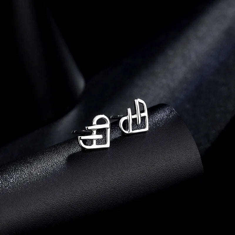 Close-up detail of the sparkling zircons and plating on the Hollow Heart Studs