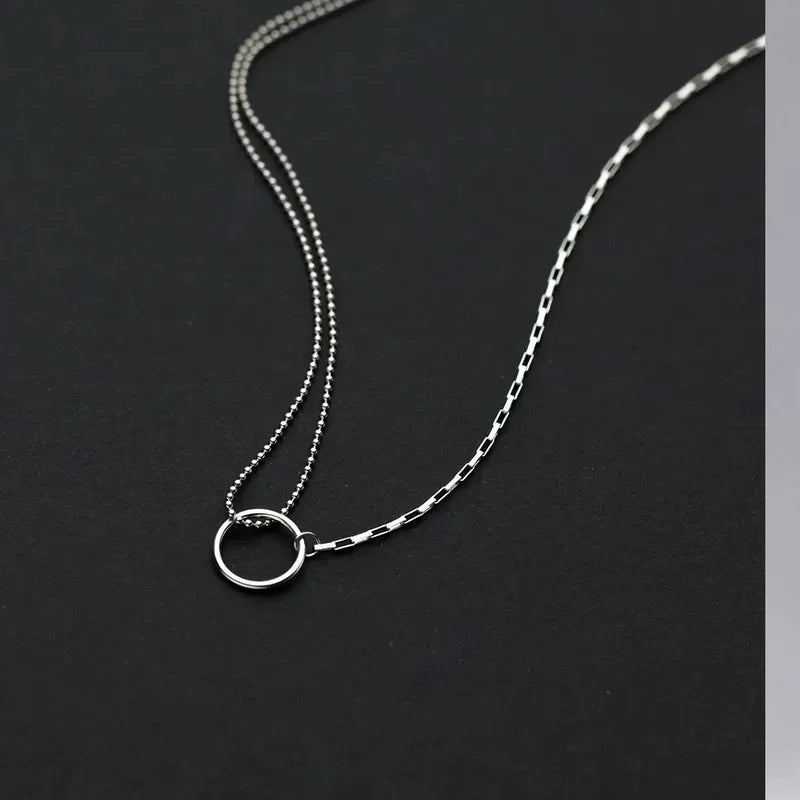 Sterling Silver Hollow Ring Necklace worn to showcase its length and pendant detail
