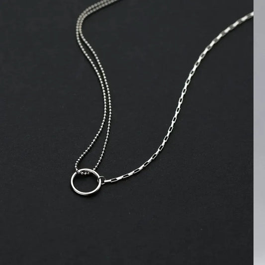 Sterling Silver Hollow Ring Necklace worn to showcase its length and pendant detail