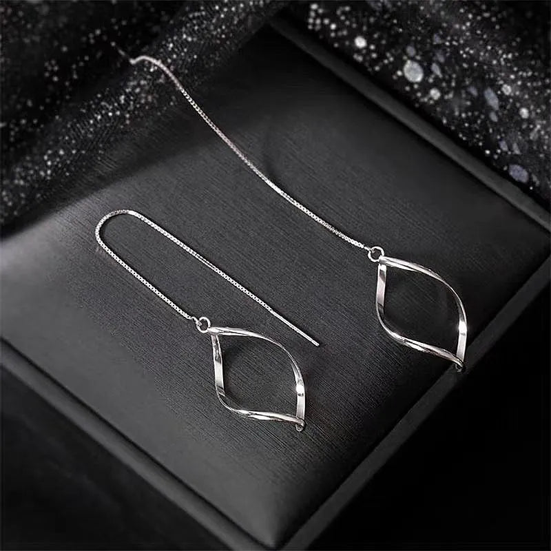 Close-up detail of the sparkling zircons and plating on the Pearl Hoop Earrings