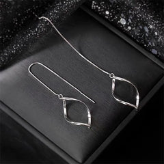 Close-up detail of the sparkling zircons and plating on the Pearl Hoop Earrings