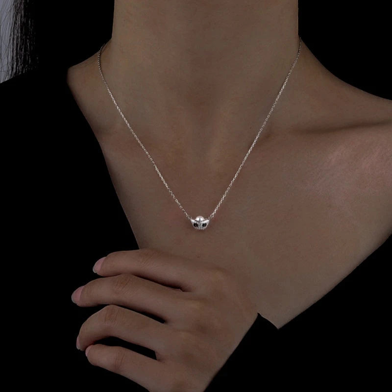 Sterling Silver Ingot Pearl Clavicle Chain Necklaces worn to showcase its length and pendant detail