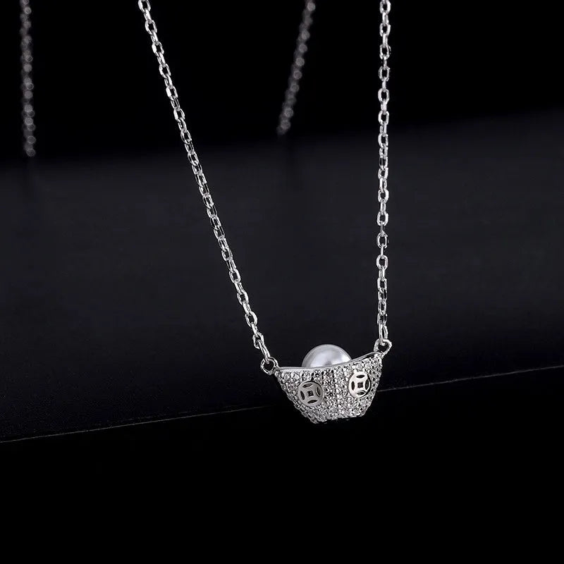 Close-up of the pendant and clasp on the Leaf Stud Earrings