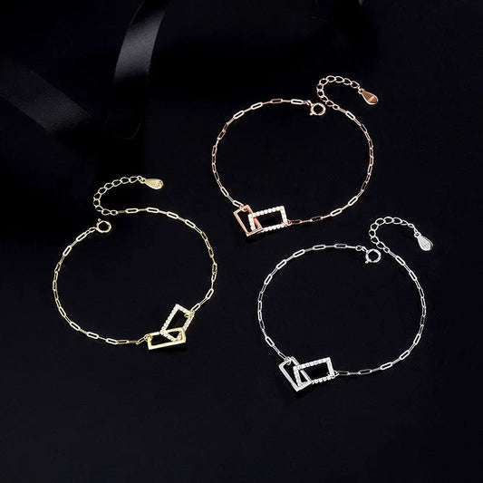 Model wearing the Sterling Silver Interlocking Bracelets to highlight its design on the wrist