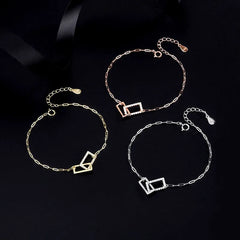 Model wearing the Sterling Silver Interlocking Bracelets to highlight its design on the wrist