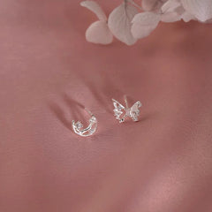 Angled view of the Sterling Silver Irregular Butterfly Moon Earrings