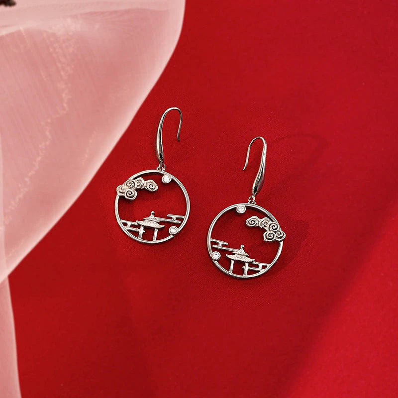 Close-up detail of the sparkling zircons and plating on the Leaf Threader Earrings