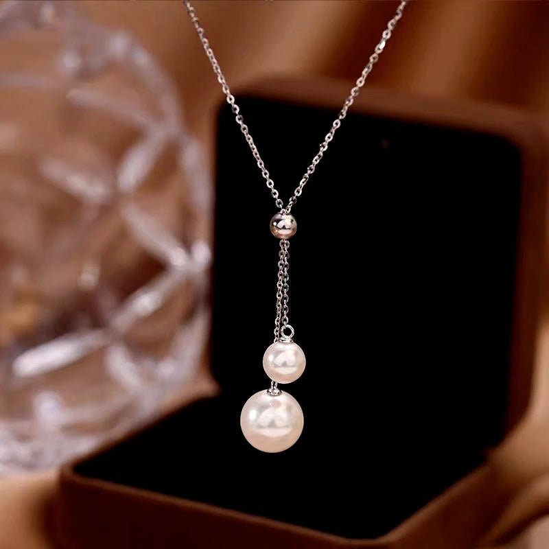 Close-up of the pendant and clasp on the Hug Ring