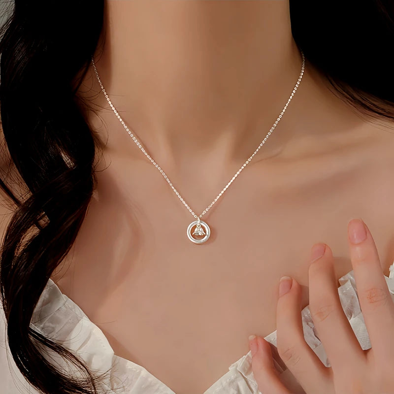 Sterling Silver Lily Of The Valley Hoop Necklace worn to showcase its length and pendant detail