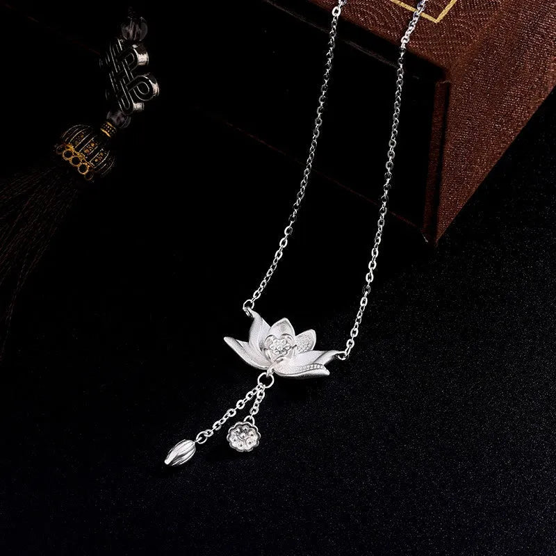 Detailed view of the Sterling Silver Lotus Tassel Necklace chain and pendant