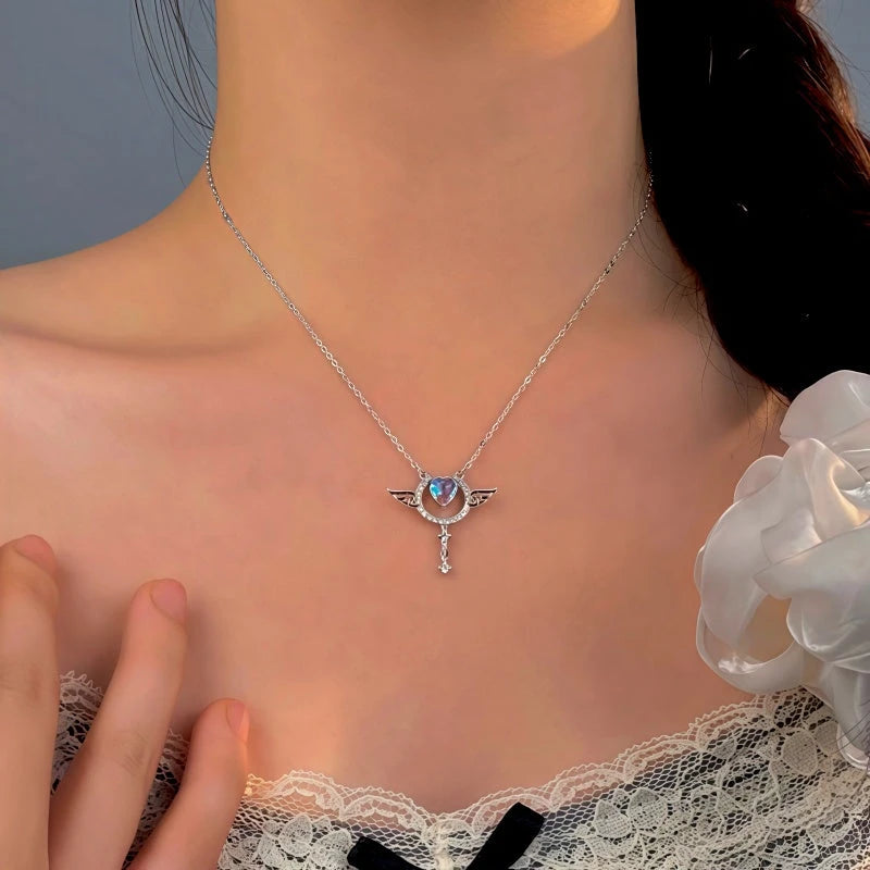 Close-up of the pendant and clasp on the Kitten Threader Earrings