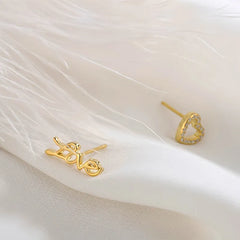 Close-up detail of the sparkling zircons and plating on the Snake Stud Earrings